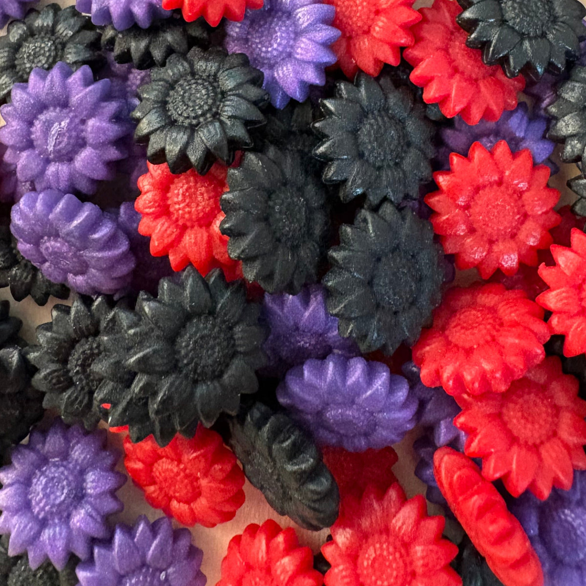 The Icarus Incident - 100 sunflower-shaped wax seal beads in Burnt Edges (Of A Blackberry Pie)